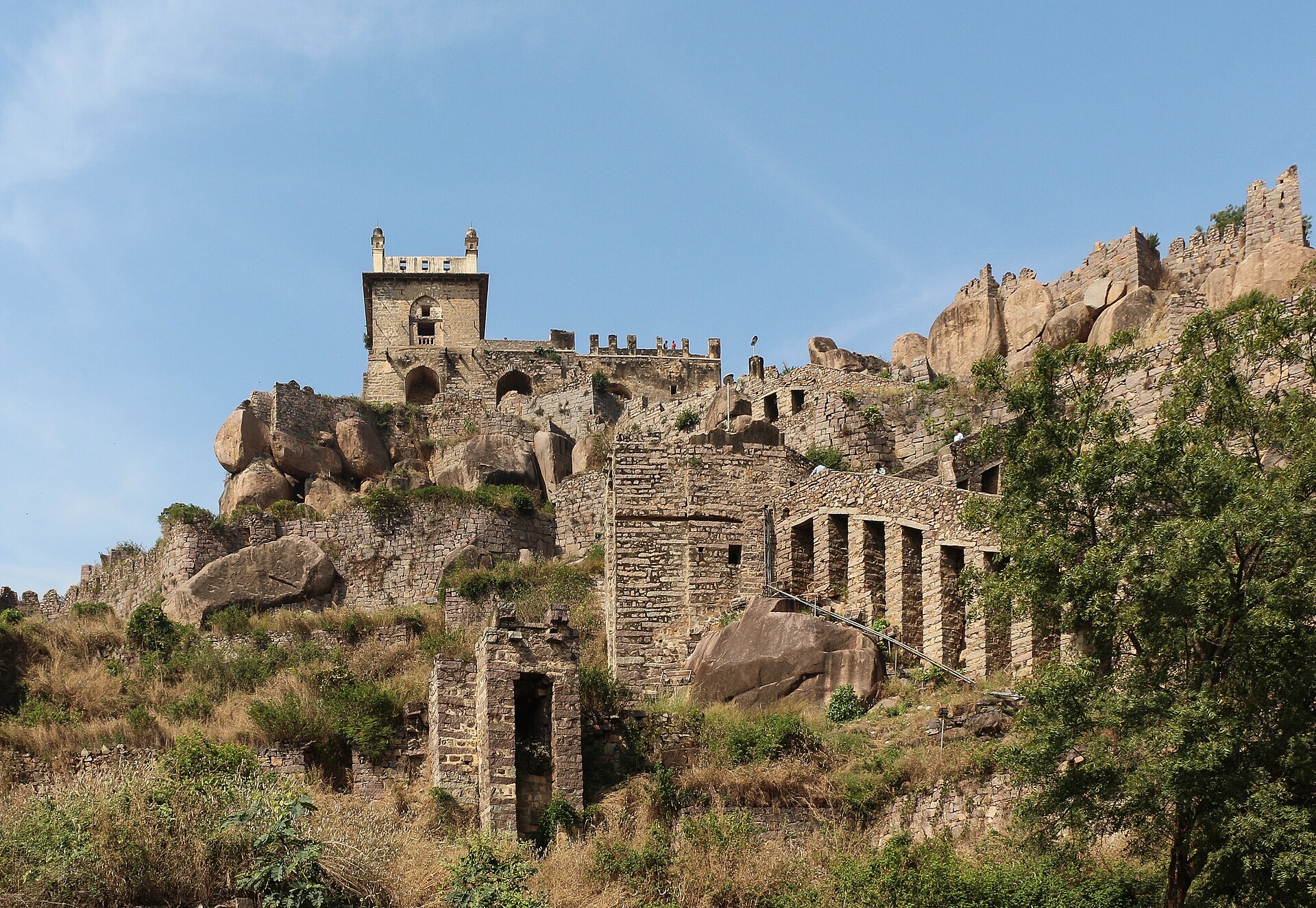 Golconda Fort climbing its granite hill, with the Baradari pavilion at the summit