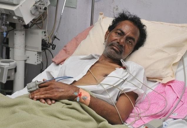 K. Chandrasekhar Rao in a Hyderabad hospital bed, on an IV drip, during his fast unto death for Telangana statehood in December 2009